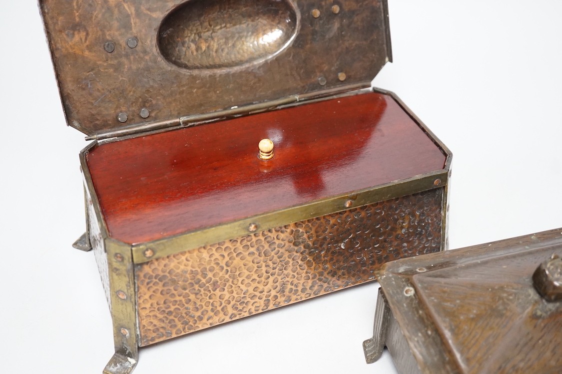 An Arts & Crafts hammered copper and brass mounted casket 23cms wide x 9cms high, together with a smaller similar casket